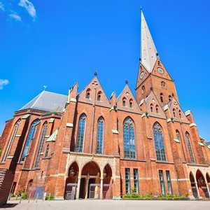 Explore Hamburg at your own speed with hop-on hop-off bus tours – Panoramic views, audio guides, and unlimited stops in 2026