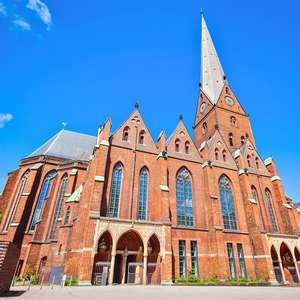 Explore Hamburg at your own speed with hop-on hop-off bus tours – Panoramic views, audio guides, and unlimited stops in 2025